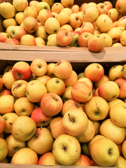 Apples on the counter in the store