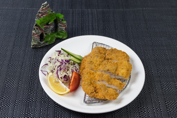 Close up view of plate with japanese food inside. Japan traditional food on wooden table. Selective focus