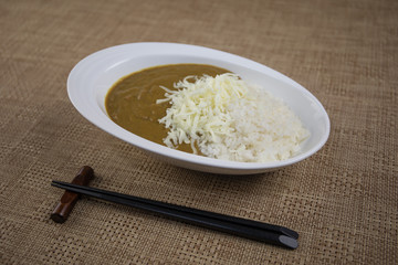 Close up view of plate with japanese food inside. Japan traditional food on wooden table.