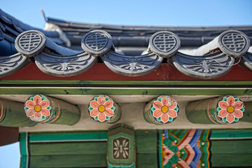 Traditional korea roof decoration. blue sky and Colorful structures
