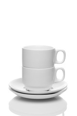 Two white cups on a white background