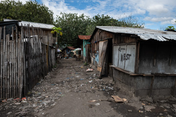 Fototapeta na wymiar Street in the dump site slum