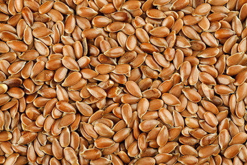 Flax seeds macro shot, abstract background