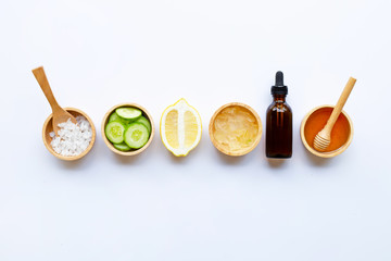 Natural ingredients for homemade skin care on white.