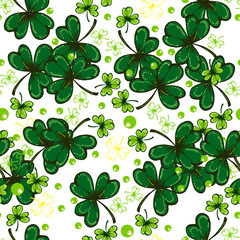 St. Patrick's Day background. Vector seamless pattern with irish symbols of St. Patrick' s holiday such as green shamrock leaves