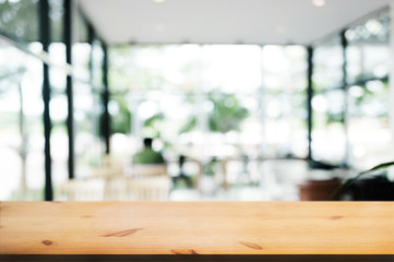 wooden table with blurred modern home background