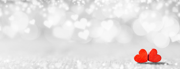 Red hearts on bokeh background