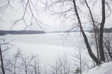 Fototapeta na wymiar Frozen pond in cold winter day. Moscow region