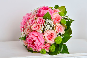 Beautiful pink wedding bouquet on white background