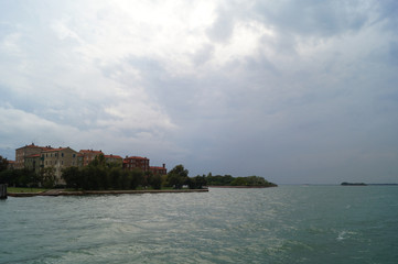 Naklejka premium on a boat through the canals of venice