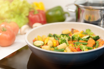 Fresh vegetables fried in a pan. Healthy nutrition concept