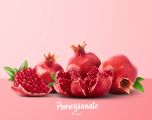 Fresh ripe pomegranate with green leaves isolated on white background.