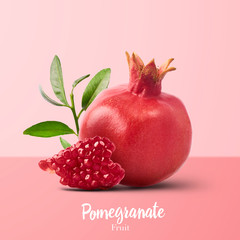 Fresh ripe pomegranate with green leaves isolated on white background.