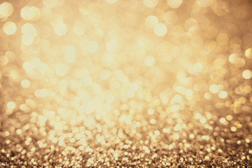 Yellow bokeh background for Valentine's day, party, event concepts.  Yellow bokeh and golden background.