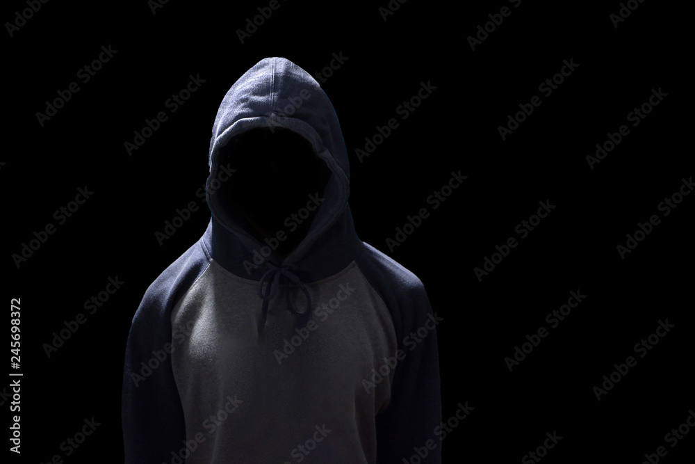 Poster hacker standing isolated on black background. human anonymous in safety security computer technology