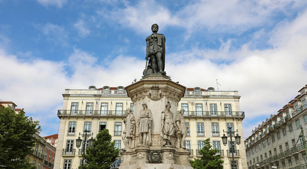 Fototapeta na wymiar View on the statue of Luis de Camoes on the square in Lisbon city, Portugal