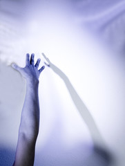 Fototapeta premium Extended arm with shadow