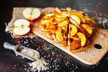 Food, dessert, pastries, pie. Tasty beautiful apple pie on a concrete background