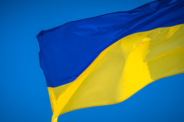 Ukrainian flag on sky background