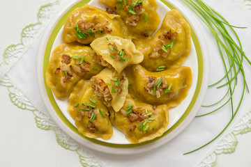 Dumplings with cabbage and fried onions. This is a very popular food in Poland, Ukraine and Russia