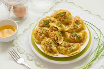 Dumplings with cabbage and fried onions. This is a very popular food in Poland, Ukraine and Russia