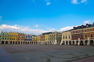 Fototapeta premium Great Market Square and colourful buildings, Zamosc, Poland