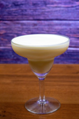 Eggnog cocktail in margarita glass