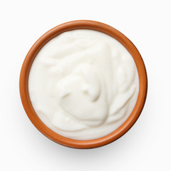 Ceramic bowl of cream, top view