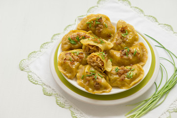 Dumplings with cabbage and fried onions. This is a very popular food in Poland, Ukraine and Russia