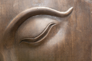 Geschlossene Augen eines Buddha Gesichtes - Buddhismus