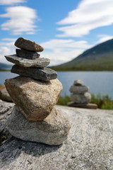 Stapled rocks near lake