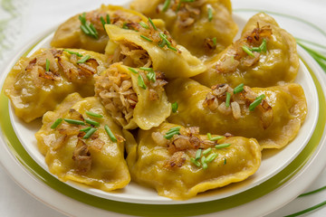 Dumplings with cabbage and fried onions. This is a very popular food in Poland, Ukraine and Russia