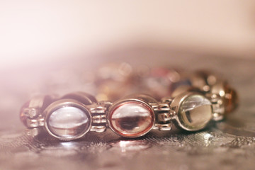 Women's metal bracelet with beautiful stones