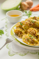 Dumplings with cabbage and fried onions. This is a very popular food in Poland, Ukraine and Russia
