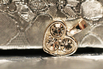 Silver heart pendant very close, Valentine's day