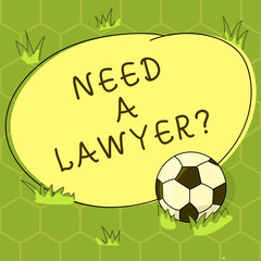 Conceptual hand writing showing Need A Lawyerquestion. Business photo showcasing Looking for legal advice or preparing legal documents Soccer Ball on the Grass and Blank Round Color Shape photo