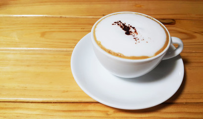 Cappuccino hot coffee white cups on wood table backgrounds