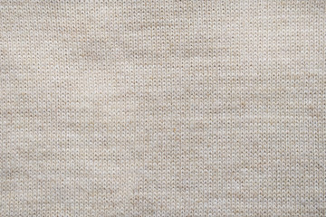 Fototapeta premium Grey knitted background. Surface wool texture. Copy space for your text