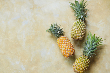 Pineapple on Stone Table Background Top Down View