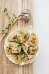 Dumplings with buckwheat porridge and fried onions. This is a very popular food in Poland