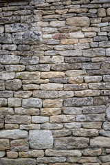 Muro in pietra grigia