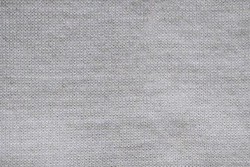 Fototapeta na wymiar Grey knitted background. Surface wool texture. Copy space for your text