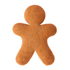 Baked gingerbread from shortbread in the form of a little man. Isolated on white background....