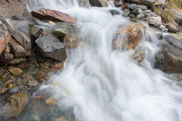 Naklejka na ściany i meble Closeup view waterfall scenes in mountains, national park Caucasus, Russia