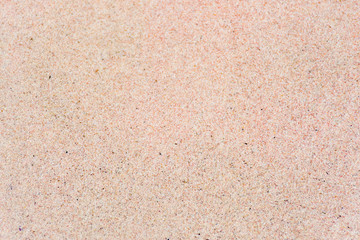 texture-pink sand on the beach