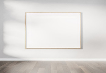 Wooden frame hanging on a wall mockup 3d rendering - obrazy, fototapety, plakaty