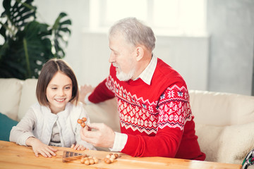 Grandpa and granddaughter are spending good time together. family, love , relationship concept