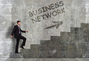 Business, technology, internet and networking concept. A young entrepreneur goes up the career ladder: business network