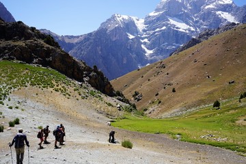 Group of people hiking in the mountains, Fann Mountains, Tajikistan 
