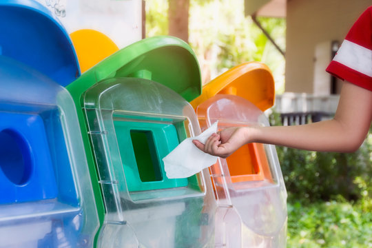 Put trash in trash by the classification of garbage. environmental safe concept
